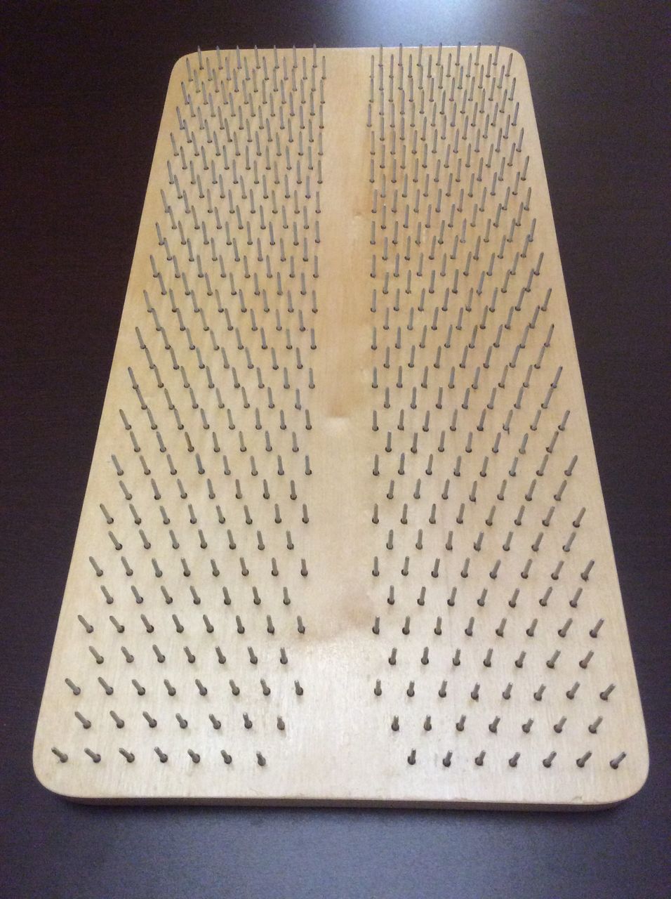 Акупунктурный аппликатор спины